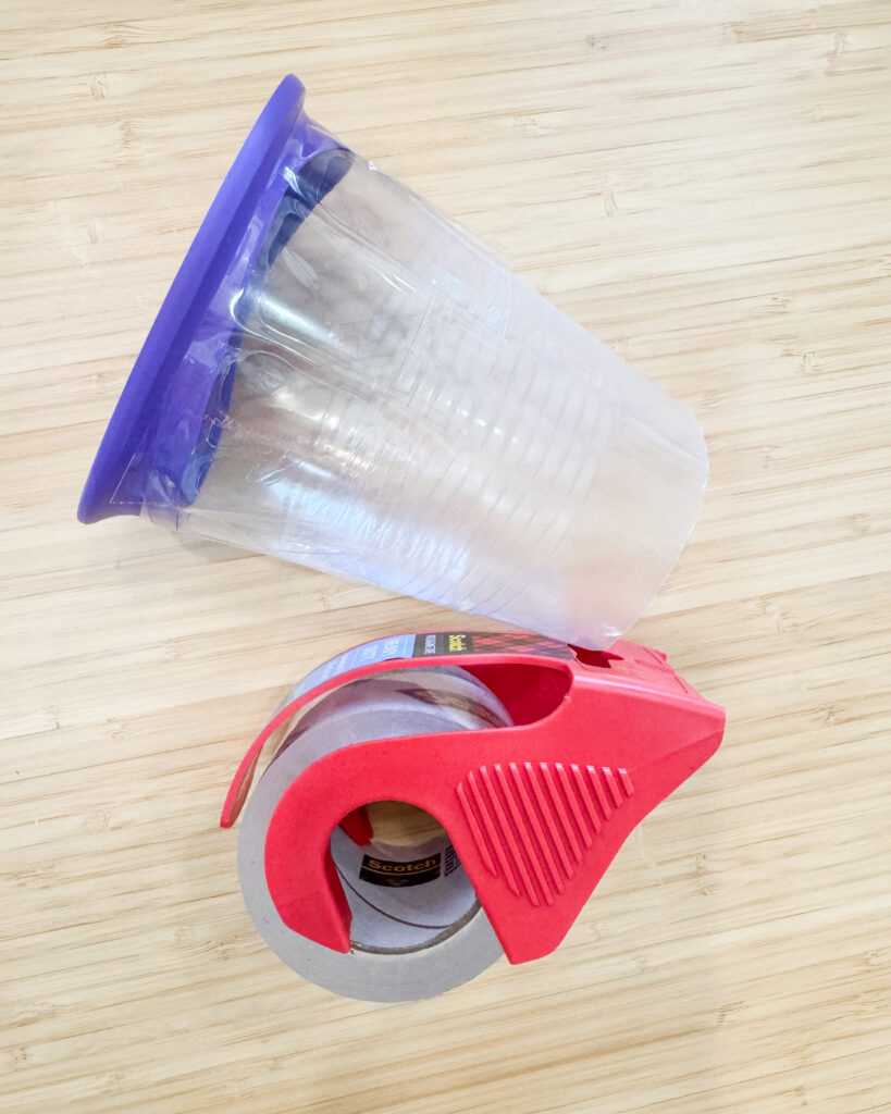 Picture is of tape on the cup securing the balloon to the cup.